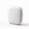 SAMLARM Zigbee Hub – vit centralenhet med blå statusindikator